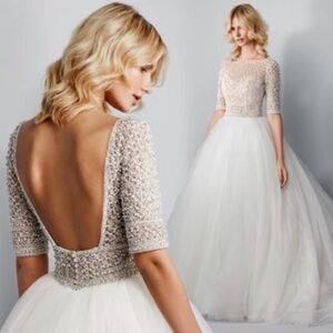 Soterro-Midgley Wedding dress. Rhinestone top. Tulle 5 layer skirt.
